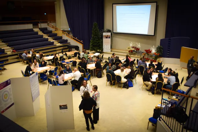 Conference hall with PhD students