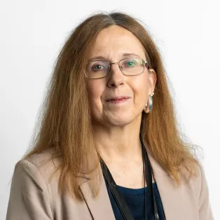 Woman with glasses and long brown hair